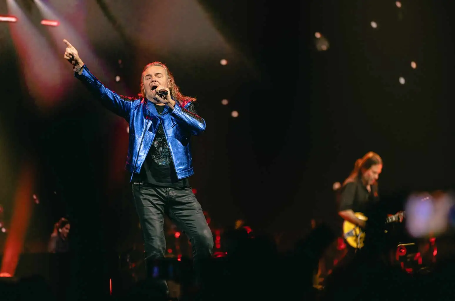 Maná performing live on stage